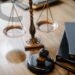 judges desk with gavel and scales